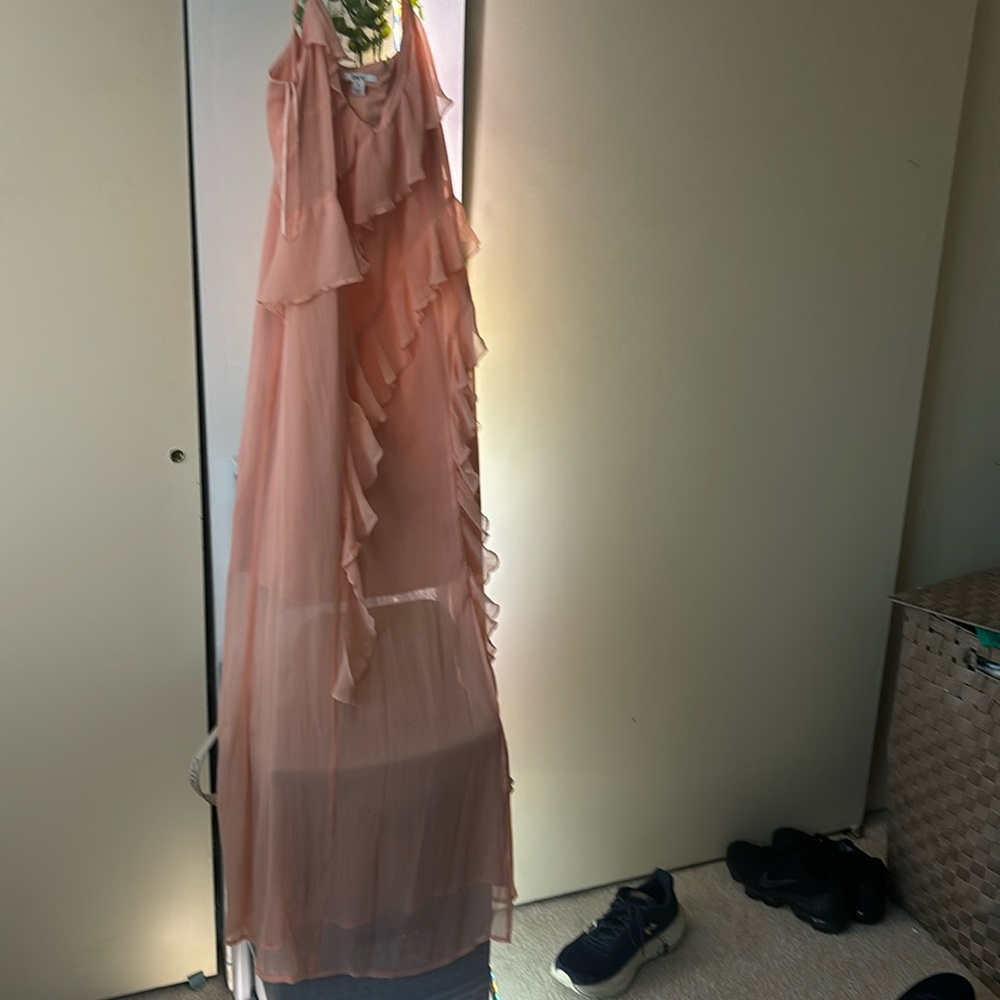 Coral prom dress with ruffles going across